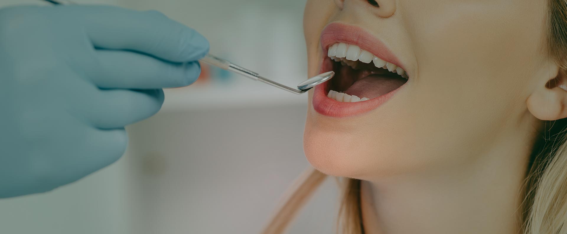 Woman having dental inspections at the dental clinic